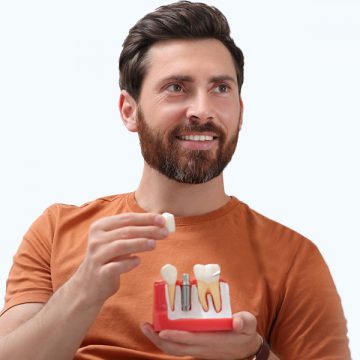 How Can You Look Younger with Dental Implants?