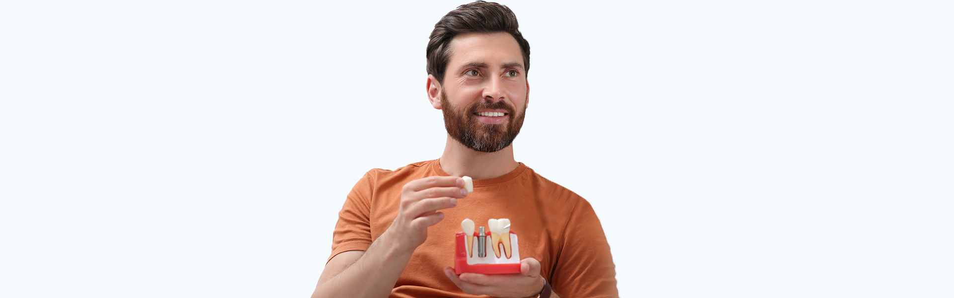 How Can You Look Younger with Dental Implants?